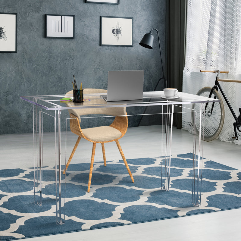 cute clear desk in home office with blue accents and a bike