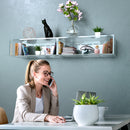 Clear acrylic box shelvein light blue office and lady at phone