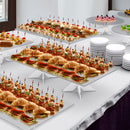 rectangular clear acrylic and round clear acrylic serving tray displays on a white fancy table