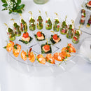 stylish, moden seerving clear tray with cocktails in a table